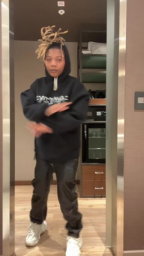 Dynamic Dance Moves in a Modern Room Setting