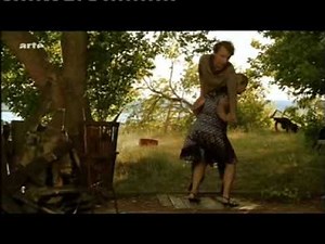 a stronger blonde woman lifts easily a poor guy to ridiculise his strength.mpg