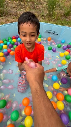 Harun and Harumi Pop Water Balloons