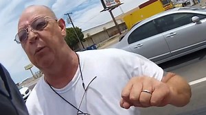 This angry driver is about to be stunned by biker