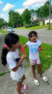 These two girls eating popsicle ￼