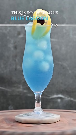 Blue Lagoon is another summer cocktail 🍹, very refreshing and easy to make! It looks amazing! 😍 Recipe: 2 oz. Stoli Vodka 🍸 1 oz. Blue Curaçao 💙 4 oz. Lemonade 🍋 Garnish: Lemon slice 🍋 and cocktail cherry 🍒 #alcohol #bar #bartender #bartenderlife #cocktailrecipe #cheers #vodka #lemonade#bluelagoon #blue #lemon #stoli