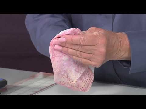 Learn how to create a double wedding ring quilt on It’s Sew Easy with Kim Montagnese. (2006-1)