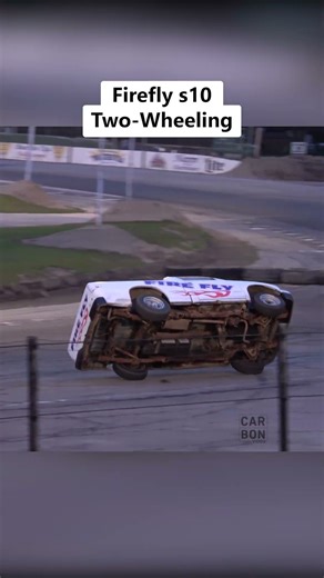 Firefly Chevy s10 two-wheeling off the ramp at Car Wars!