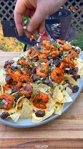 Ever try surf & turf nachos? | Over The Fire Cooking by Derek Wolf