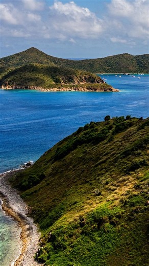 Tucked away in the northeastern Caribbean, the British Virgin Islands are a sailor's paradise and a traveler's dream — a constellation of over 60 islands, cays, and islets draped in lush green hills and surrounded by some of the clearest turquoise water in the world. Whether you're chasing adventure in hidden sea caves, snorkeling above vibrant coral reefs, or simply sipping a cocktail at an overwater bar as the sun dips below the horizon, the BVI has a way of capturing your heart and refusing t