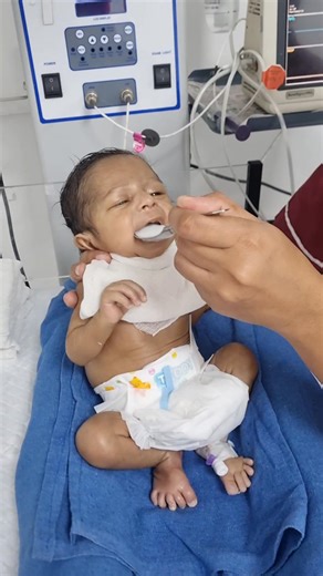 My cute 😍 baby 👶 In the quiet rhythm of the NICU, feeding time feels like a small miracle. Each tiny sip is not just milk, but strength, courage, and hope flowing into a delicate body. The world outside may be big and noisy, but here, in this moment, it is only the soft beeping of machines, the warmth of loving hands, and a brave little heart learning how to grow. Every slow swallow is a victory, every pause a reminder of how precious and fragile life is. Feeding time is not just nourishment, 