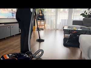 Vacuuming the living room