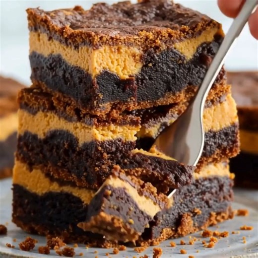 Chocolate Pumpkin Cheesecake Bars Ingredients: - 15.25 ounces chocolate cake mix (boxed) - 1 large egg - ½ cup salted butter (melted) - 8 ounces cream cheese (softened to room temperature) - 15 ounces pumpkin puree (1 can) - 2 large eggs (room temperature) - 1 teaspoon vanilla extract - 2 teaspoons ground cinnamon - ½ teaspoon salt - 1 teaspoon ground nutmeg - 1 teaspoon ground cloves - 3 cups powdered sugar - ¾ cup all-purpose flour - ¾ cup brown sugar - 2 teaspoons ground cinnamon - 8 tablespo