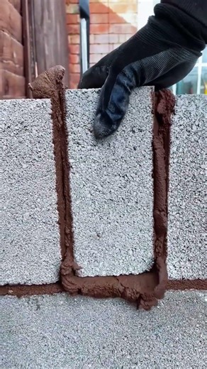 Installation of brick pieces fitted accurately to required size