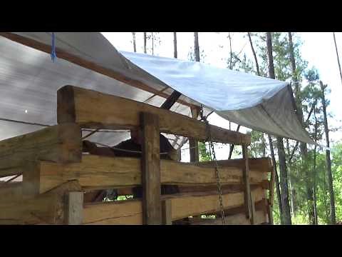 Hand hewn log cabin by Rusty Lindberg