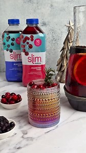 Featuring SunRype Slim Blueberry Burst and Cranberry Twist, this delicious mocktail makes plenty to share with your friends and family and is perfect for Holiday toasts! 🥂🎄 ​Blueberry Burst Holiday Mocktail​ 🍹​ Ingredients:​ 4 cups SunRype Slim Blueberry Burst​ 2 cups SunRype Slim Cranberry Twist​ 1 cup pomegranate juice​ 1 cup sparkling water or club soda​ 1 cup blueberries​ (fresh or frozen) 1 cup cranberries​ (fresh or frozen) 1 orange, thinly sliced​ 1 lemon, thinly sliced​ Fresh rosemary