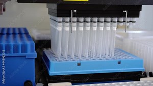 Automation in the clinical laboratory. Pipetting robot laboratory. Medicine robotics. automated pharmaceutical laboratory. Research and science background