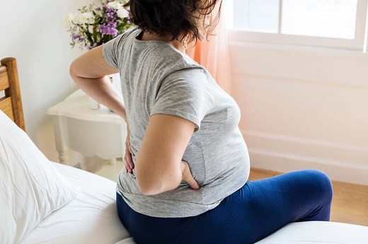 4 Pregnancy Back Pain Symptoms You Shouldn't Ignore
