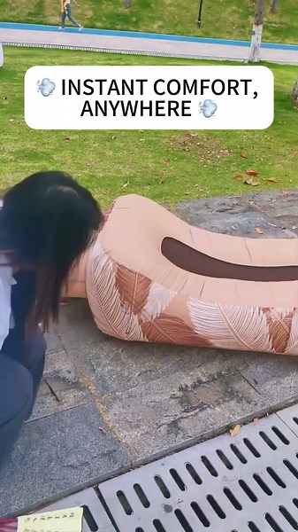 Inflatable couch designed for outdoor lounging at parks, beaches, or music festivals.