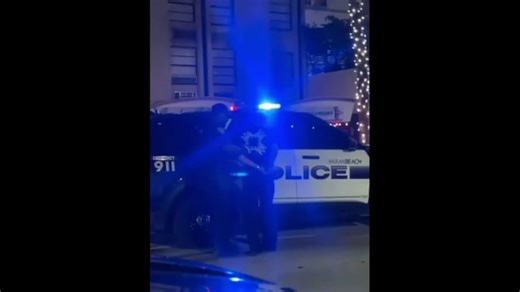 Police officers arrests Jack Doherty in Miami Beach