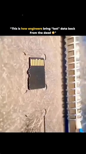 Filled Fact on Instagram: "Every SD card has a hidden memory chip that stores digital information long after the plastic shell or circuits are damaged. Data recovery specialists carefully expose the chip, clean its contacts points under a microscope, and then connect it to a specialized reader board that interprets raw binary data directly from the chip itself. DM FOR CREDIT"