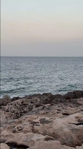 Waves Crashing on a Rocky Shore 🌊