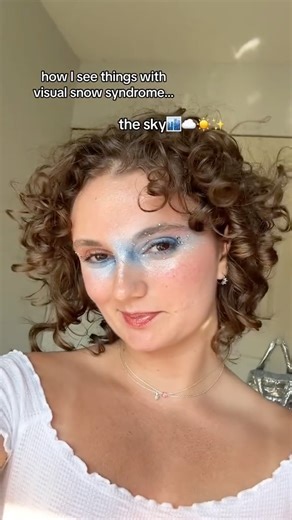 Visual Snow Initiative on Instagram: "How i see things with visual snow series: the sky️☁️✨☀️ What a beautiful way to showcase Visual Snow Syndrome using makeup – truly inspiring! Credit: @rubysfx"