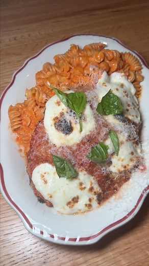 Parm on Instagram: "Required eating at @parm: our classic Chicken Parm Platter with Spicy Rotini. 🍝 #parm #majorfoodgroup #chickenparm"