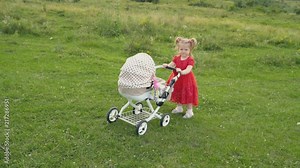 little girl with a stroller