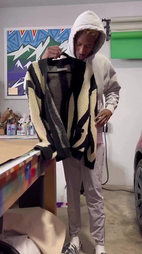 4.6K views · 113 reactions | This sweater from @robhill.art uses Tulip ColorShot Fabric Spray Paint for bold, retro designs!  We love a colorful custom cardigan and Rob's creative eye ✨ #menfashion #mensfashionstyle #fabricspray #diyfashion #upcycledclothing #upcycledfashion #cardigansweater | TulipColorCrafts | Facebook