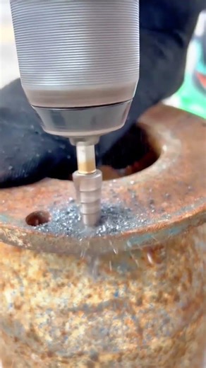 Drilling a Precise Hole in a Thick Metal Surface Using a High Quality Step Drill Bit Tool