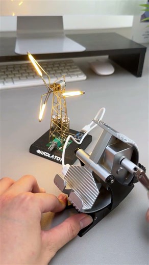 All-purpose hand-cranked power generator phone holder