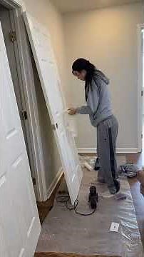 Painting the hallway upstairs with accessible beige from sherwinwilliams Now I need new doorknobs!