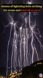 An intense lightning outbreak over a coastal landscape, where a powerful storm system released dozens of cloud-to-ground and cloud-to-water lightning discharges in rapid succession. Inside the towering storm clouds, strong updrafts cause ice particles to collide and separate electric charges on a massive scale. Large regions of opposite charge build up within the cloud and between the cloud and the surface below. When the electrical imbalance becomes too great for the air to insulate, multiple d