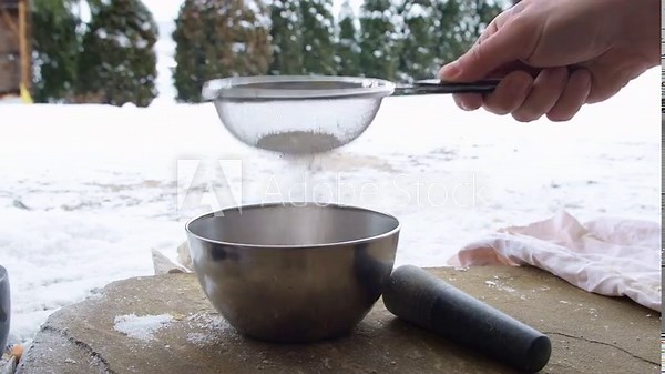 sifting powder through a sieve, limestone crushed in a mortar Stock Video