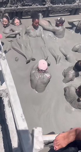 Girls Enjoy a Mud Bath in Colombia | Mud Volcano Adventures