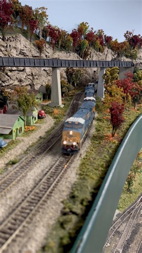 Hauling freight under the bridge #modeltrains