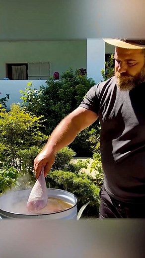 312K views · 5.2K reactions | Chicken legs boiled until tender, then pan-fried to golden perfection under the open sky — crispy on the outside, rich in flavor, and wrapped in the calm of nature. A simple yet flawless recipe by Kanan Badalov you’ll want to recreate again and again. #KananBadalov #ChickenRecipe #PanFried #OutdoorCooking #Cooking | Fire Up, Bro | Facebook