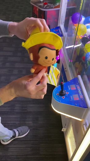 Curious George Claw Machine Adventure