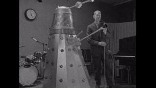 This Month’s DFA Staff Pick: Christmas 1960s Style! ✨🎄 Few designs scream the 60s like the iconic Daleks from Doctor Who! In 1965, as Dalekmania swept across the UK, toyshops were buzzing with fans eager to bring home the time-traveling Doctor’s most feared foes. 🛸 Move over, Beatlemania—this was the year of Christmas with a Dalek! See this and more on the DFA website: https://ow.ly/Inik50UkXav Christmas with a Dalek (1965) Courtesy of UTV © ITV #Dalekmania #DoctorWho #1960sChristmas #RetroVib