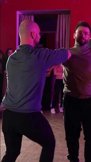 Two men dancing together