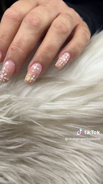 Creative Winter Nails with Snowflake Designs