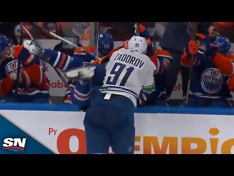 Canucks' Nikita Zadorov Absolutely Levels Evander Kane Into Oilers Bench