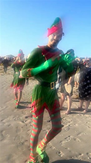 Found two elfs at Cocoa Beach florida surfing Santa #christmas #xmas #holiday #funny #trending