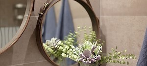 Frame Your Mirror with Decorative Molding | DoItYourself.com