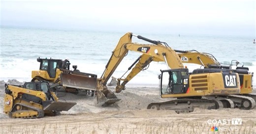 Dozer briefly disabled in surf during DNREC sand bypass work at Indian River Inlet