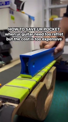 Guitar fret levelling