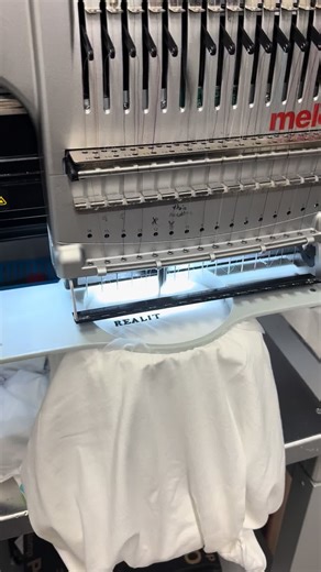 It’s all in the details 👀 Watching your logo come to life, stitch by stitch #realityhilldesigns #embroidery #teamapparel