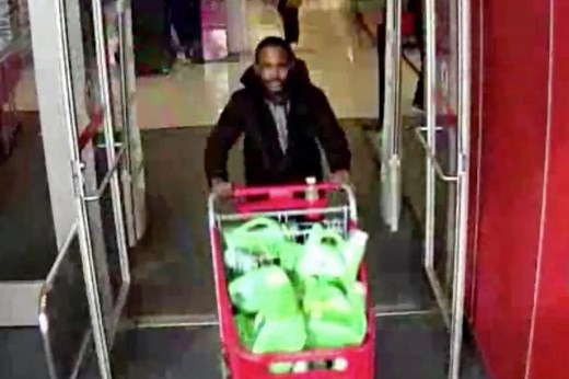 Target crook sprays substance at cop who tries to stop him