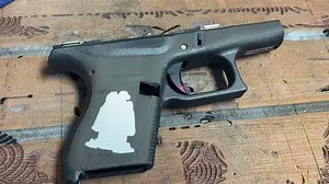 Here is a small real time video of a G43 being Lasered for a customer. Of course there is a good bit of sanding, prep, design and layout and even a trip to the Cerakote shop at Roman Arms before unleashing the laser onto the frame but this shows you some of the different steps involved in creating a one color logo on a blank Glock frame. PS, this pattern is referred to as “Chainlink”. Enjoy! | San Antonio Laser Engraving