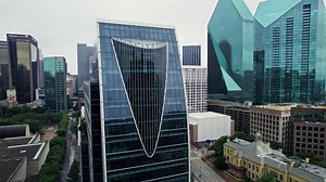 A large building with a triangular shaped roof