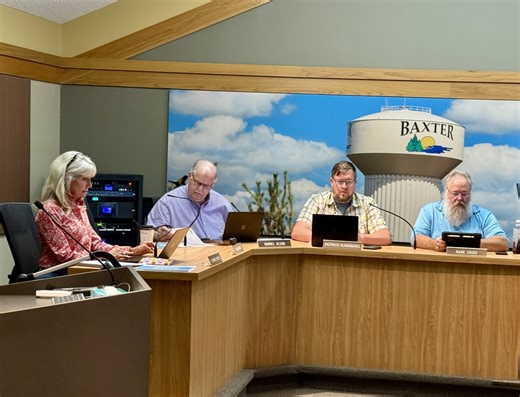 Baxter tables action on streets/utilities project
