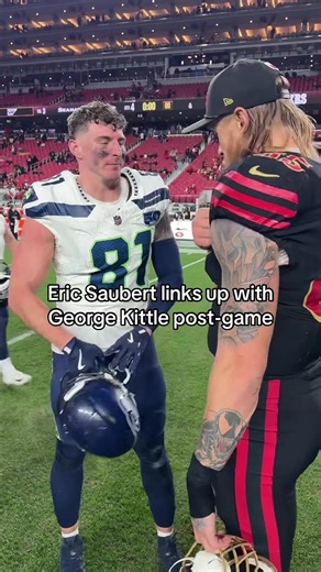 Eric Saubert Celebrates with George Kittle After Game