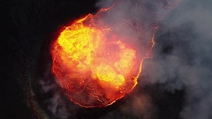 Close look on volcano. Incredible aerial of the dramatic volcanic eruption of the Fagradalsfjall (Geldingadalur) volcano eruption in Reykjanes peninsula Iceland. Flowing lava.